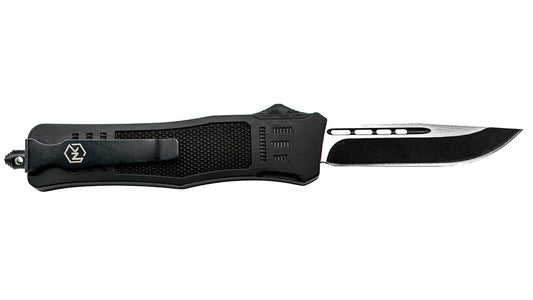 Black OTF 44C spear point knife with black handle, belt clip, and glass breaker on a white background