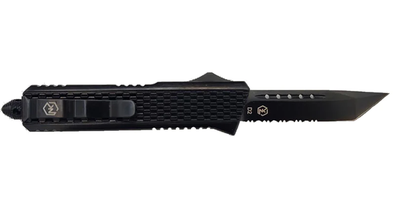 Black tactical knife with a textured handle and serrated blade on a white background